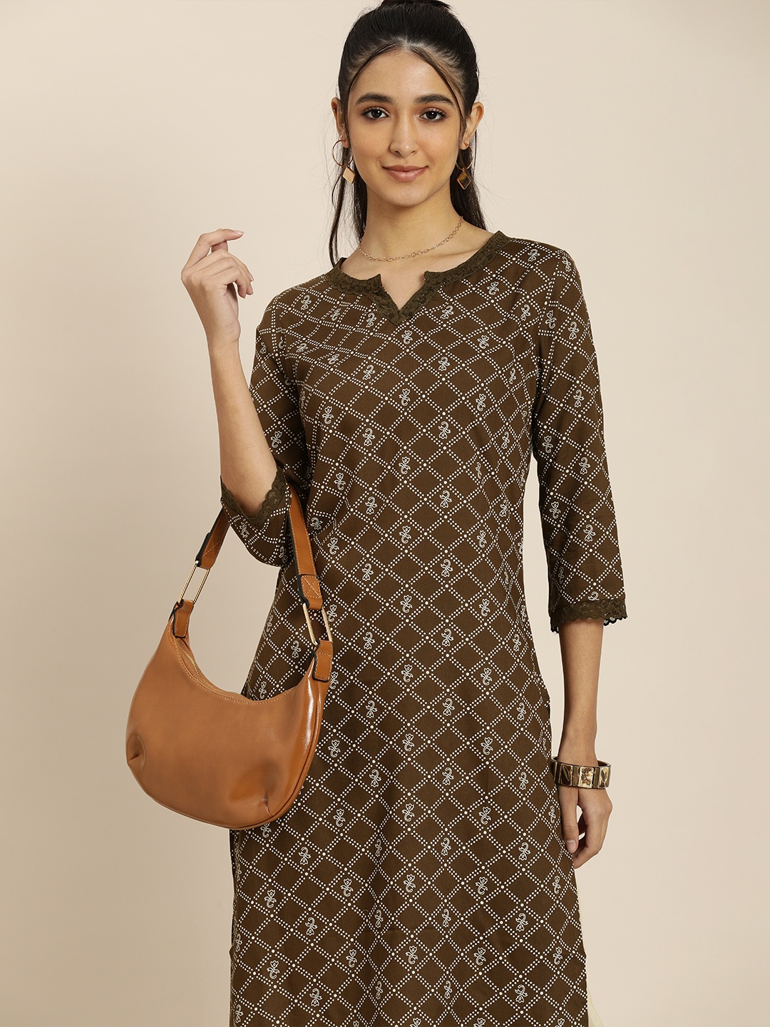 

Sangria Women Brown Geometric Printed Kurta with Trousers