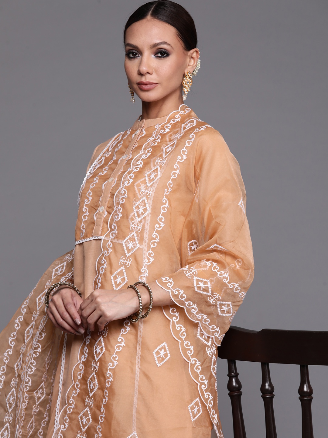 

Indo Era Women Peach-Coloured Embroidered Kurta with Trousers & With Dupatta