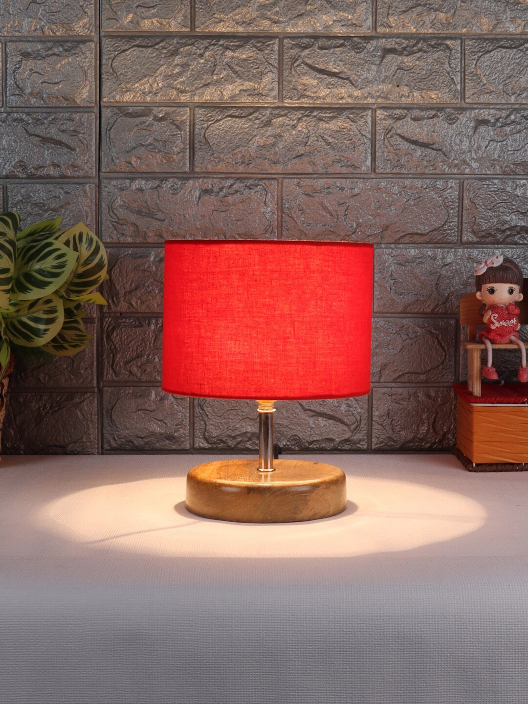 

Devansh Red & Beige Wooden Table Lamp with Cotton Shade