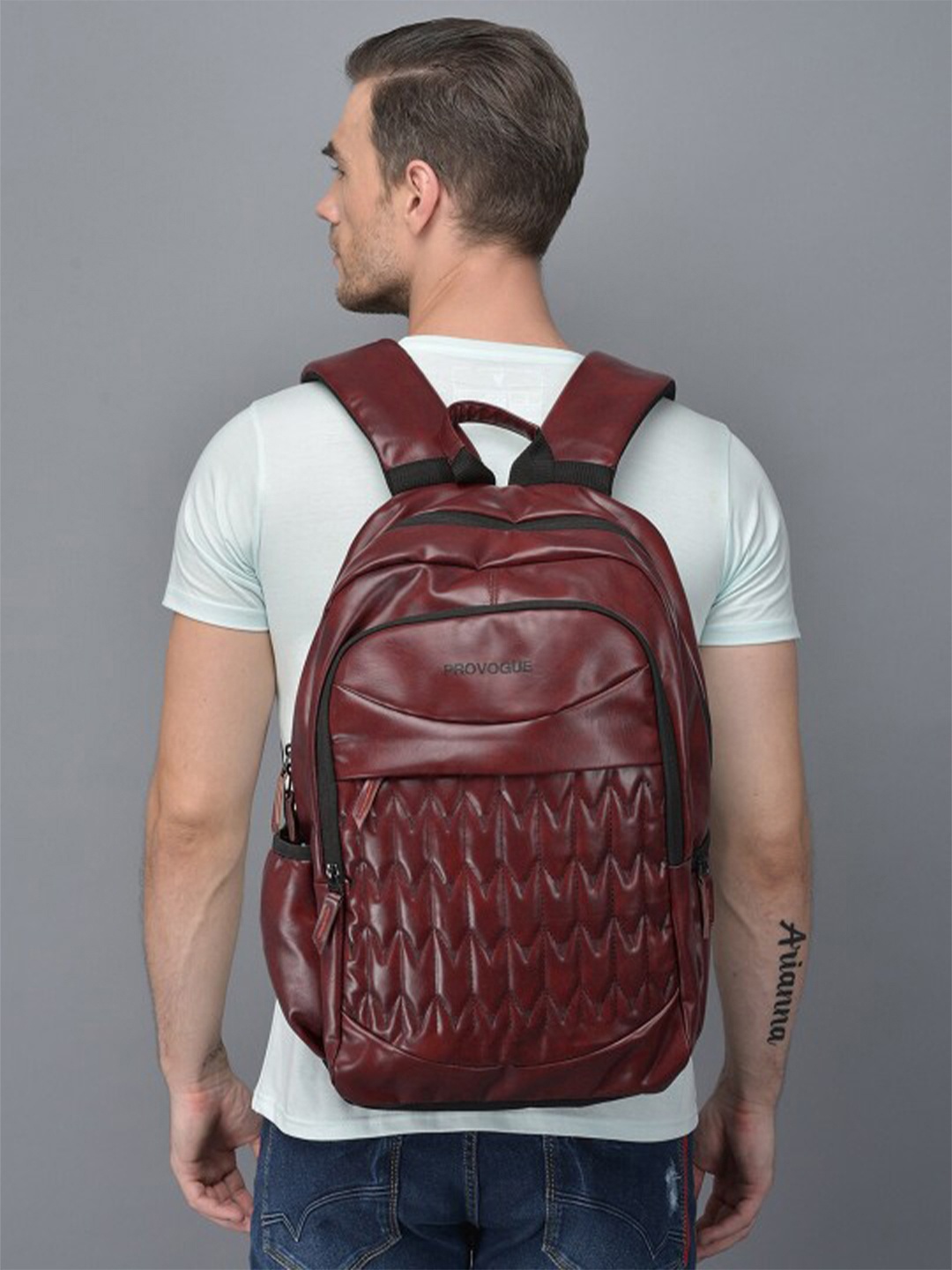 

Provogue Maroon Solid Brand Logo Printed Leather Backpack With Rain Cover
