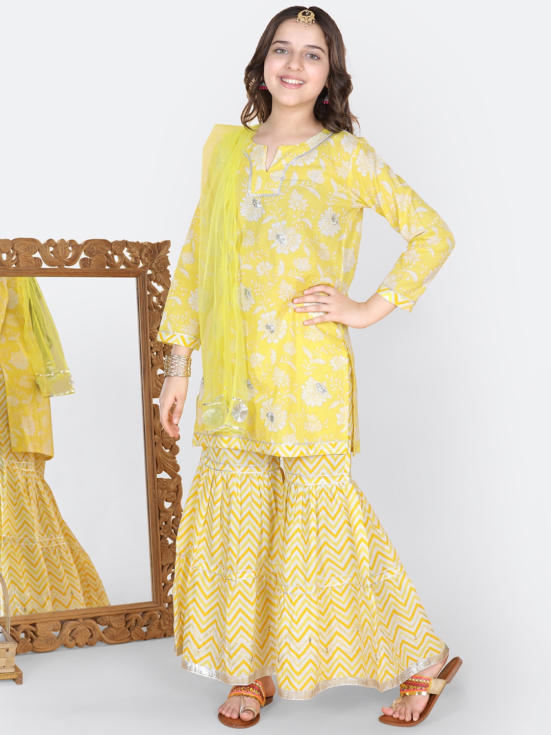 

ADIVA Girls Yellow Floral Printed Gotta Patti Kurti with Sharara & With Dupatta