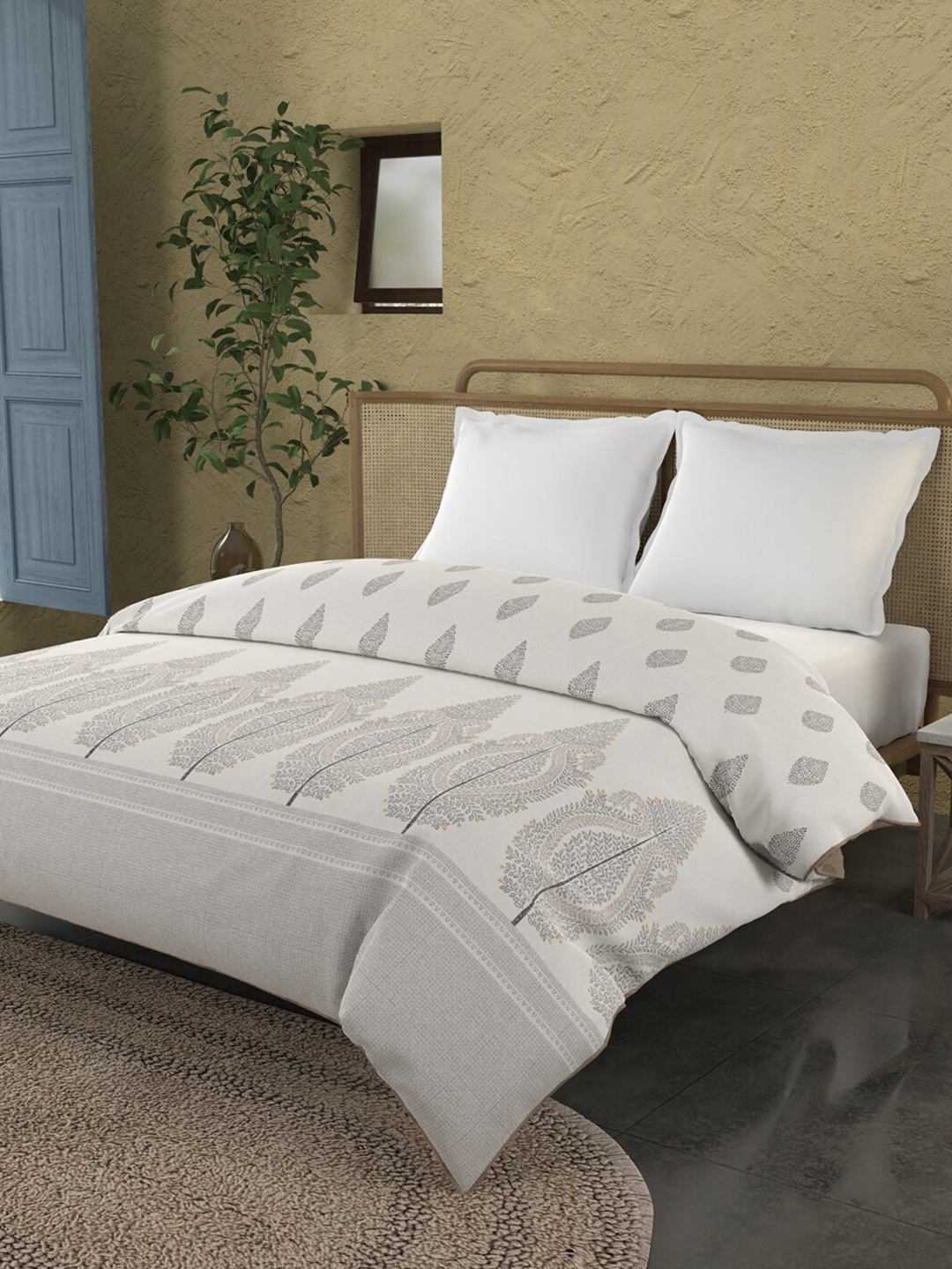 

Trident Brown Ethnic Motifs AC Room 150 GSM Double King Size Cotton Reversible Comforter