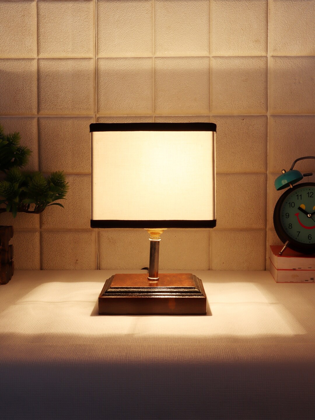 

Devansh Brown & White Wooden Table Lamp with Cotton Square Shade