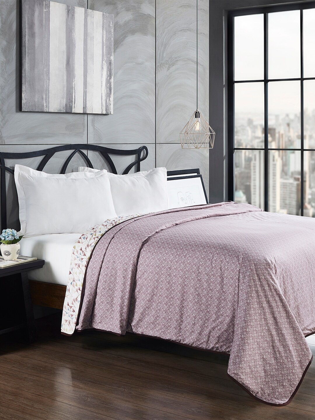 

Trident Purple & White Floral AC Room 110 GSM Double Bed Dohar