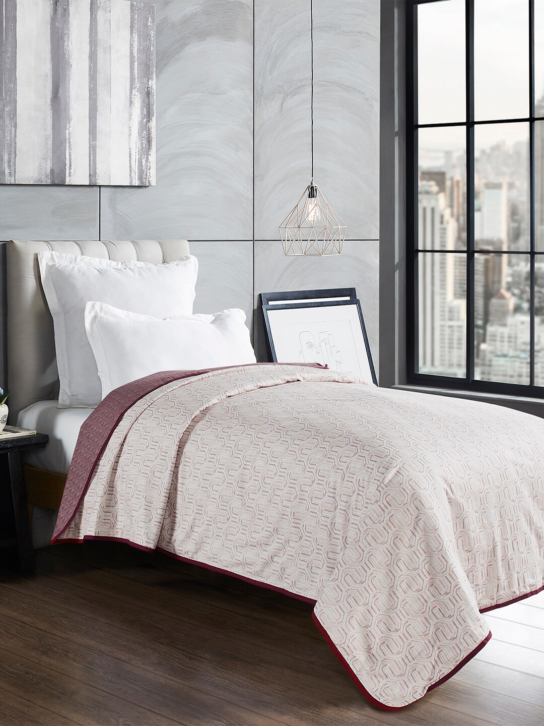 

Trident Maroon & White Geometric 110 GSM Reversible Single Bed Dohar