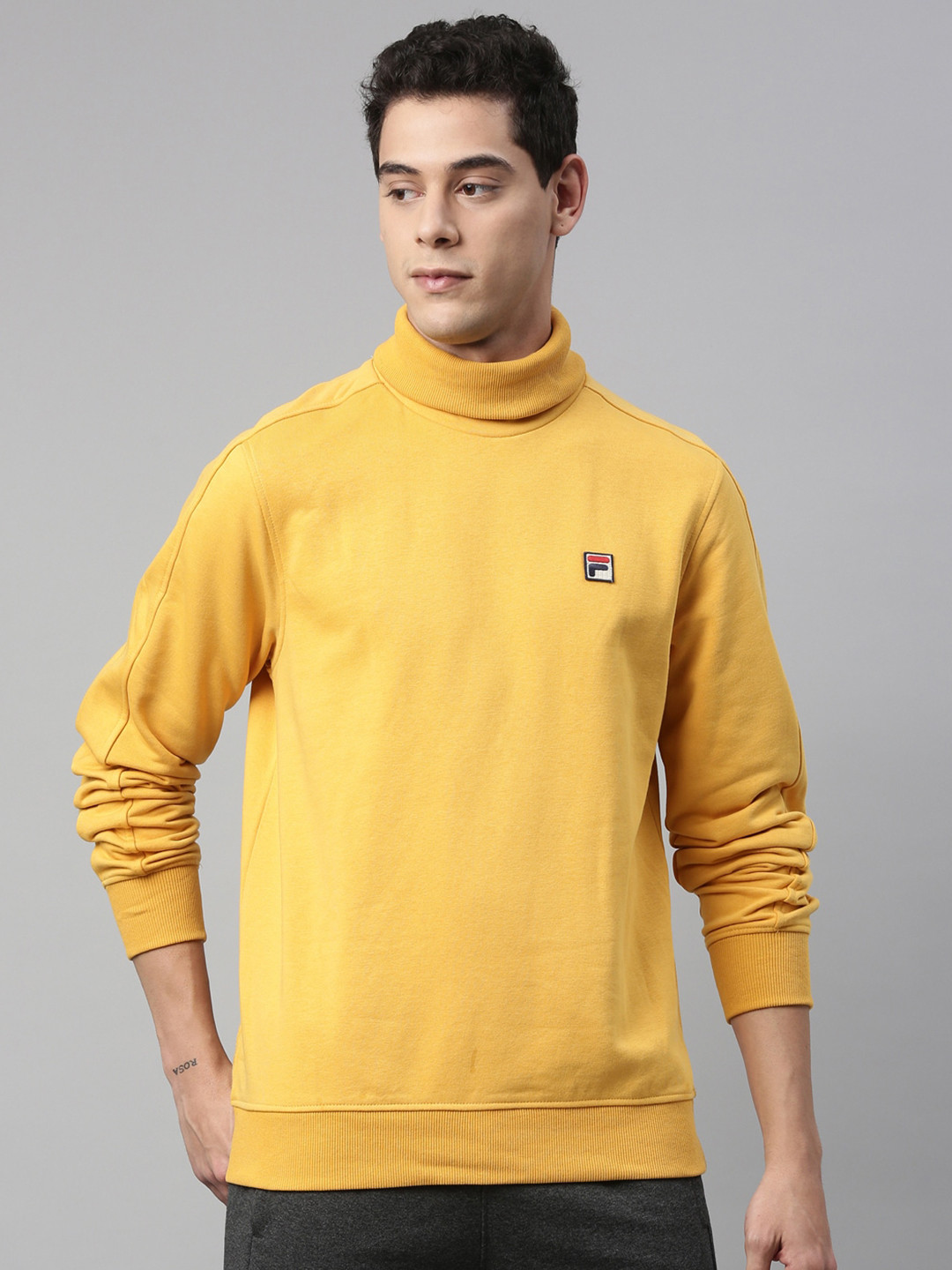 

FILA Men Yellow Solid High Neck Sweatshirt