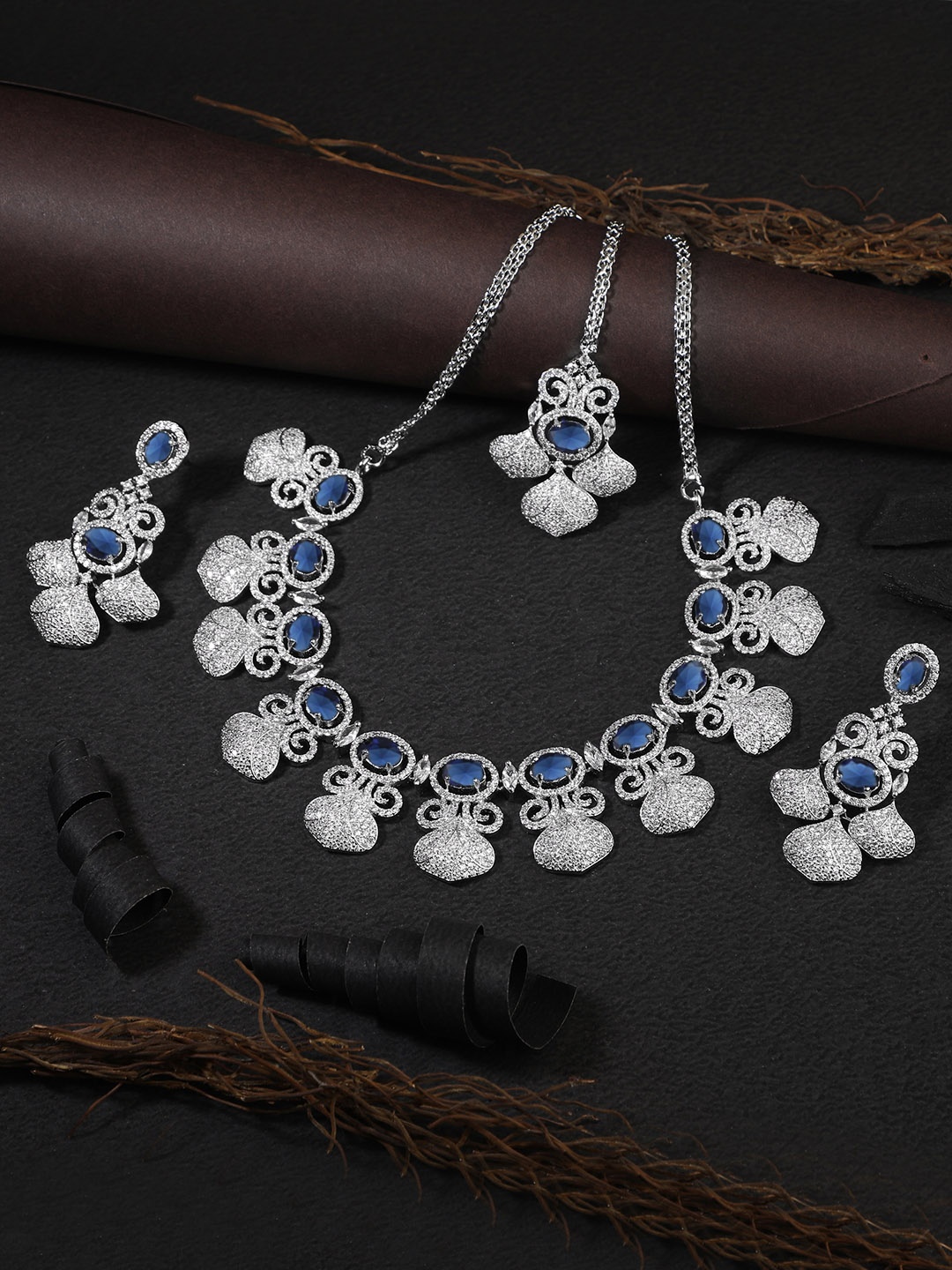 

Adwitiya Collection Women Silver Rhodium Plated Blue CZ Stone Studded Jewellery Set