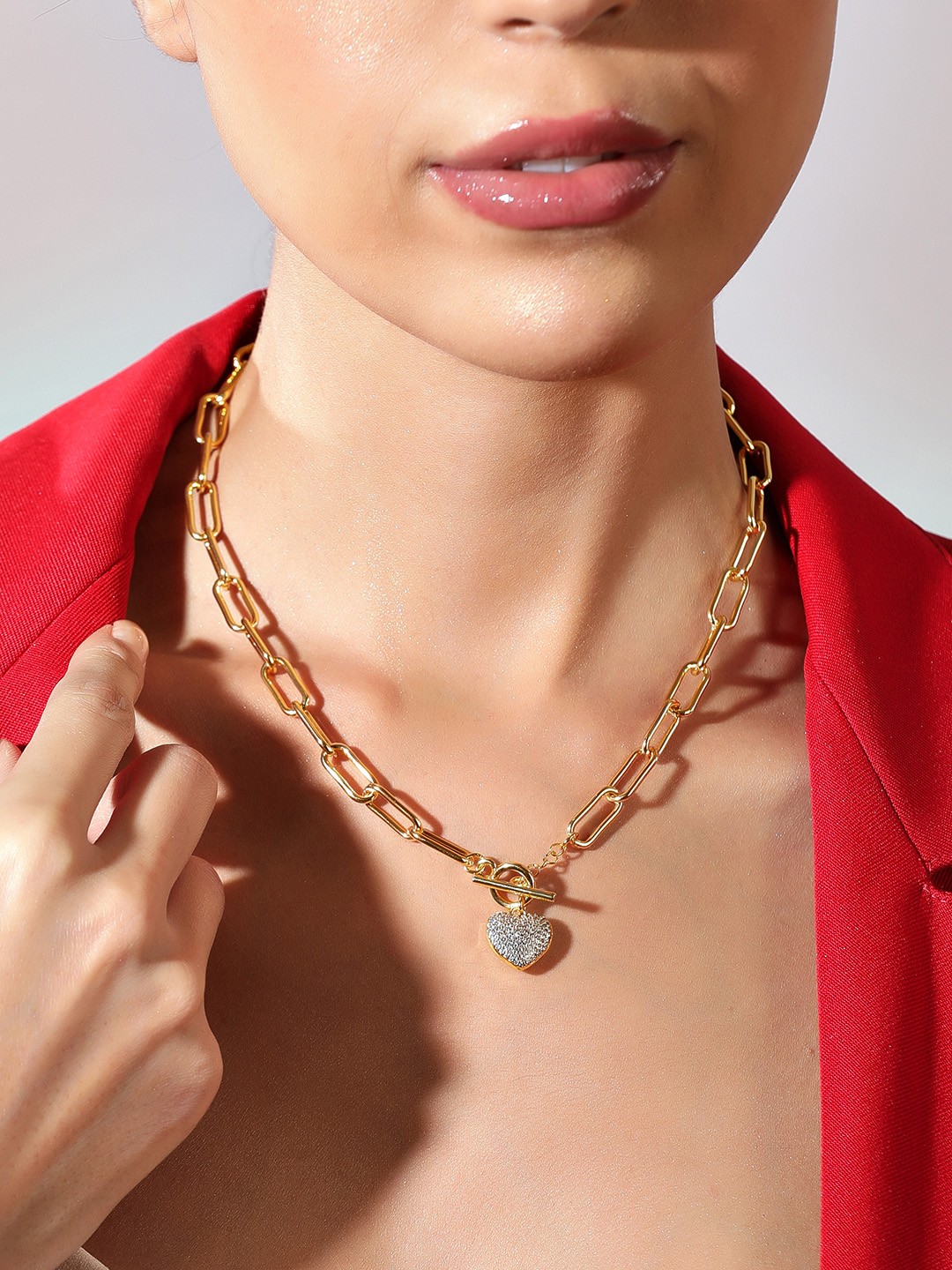 

Rubans Voguish Gold-Toned & Gold-Plated AD Studded Heart Shaped Pendant Necklace