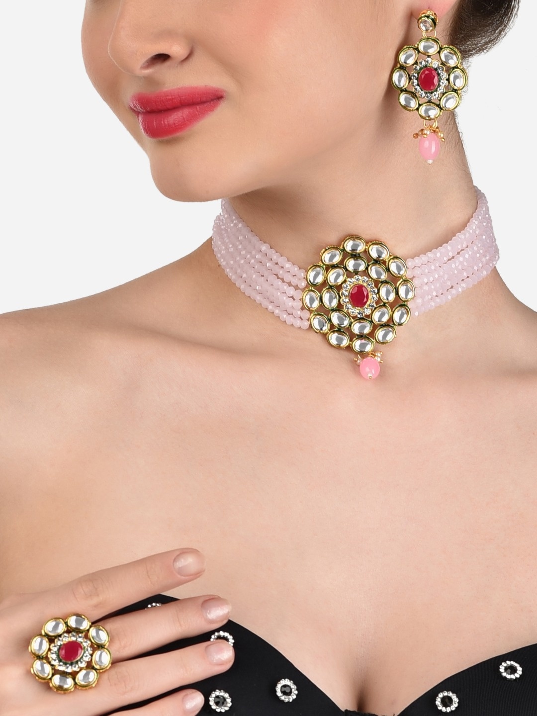 

Zaveri Pearls Women Gold-Toned & Pink Kundan Studded Beaded Jewellery Set