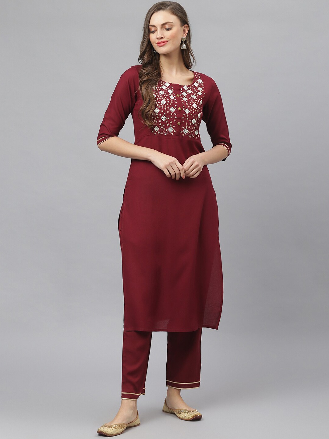 

Stylum Women Maroon Floral Yoke Design Mirror Work Kurta with Trousers