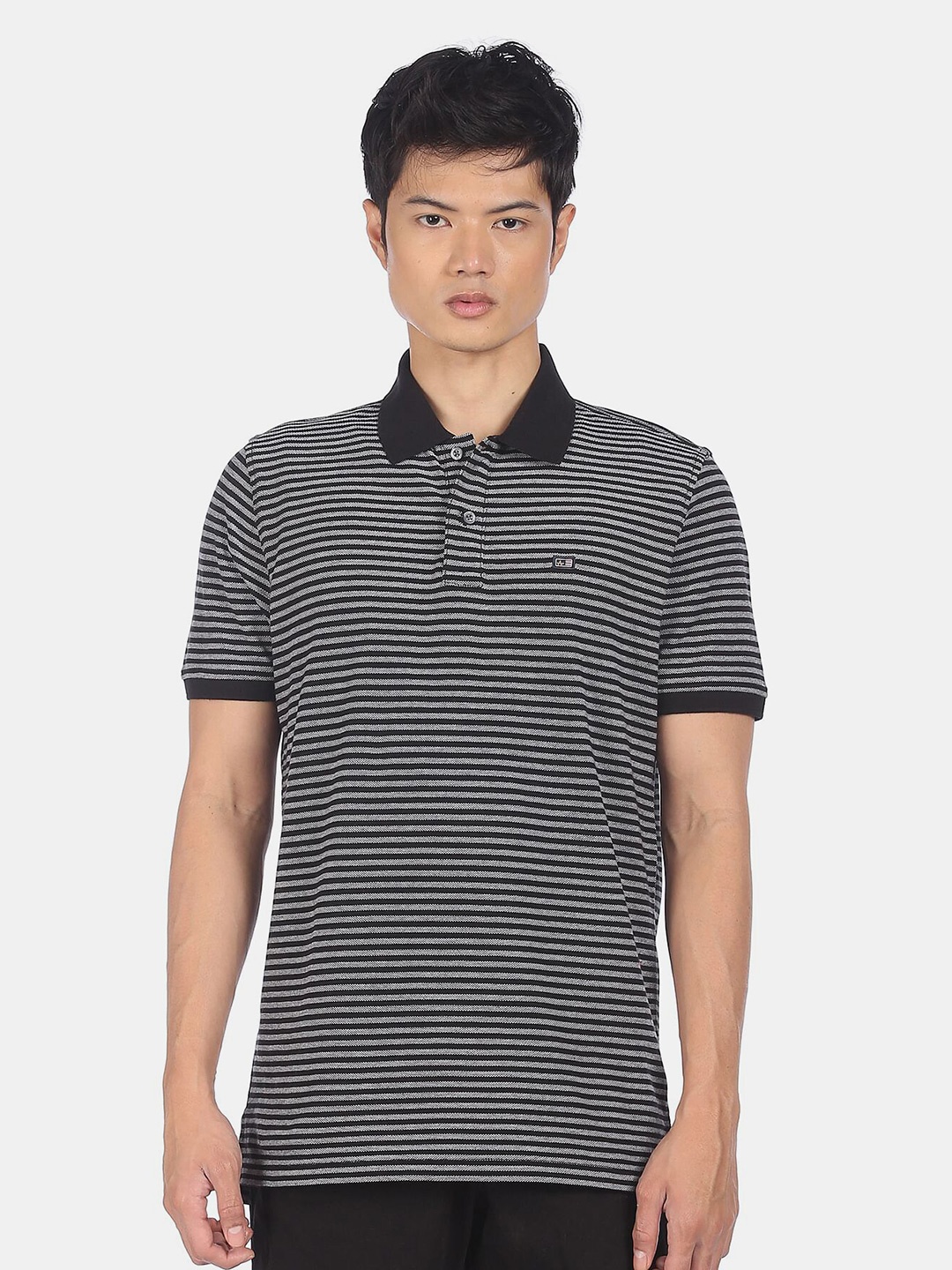 

Arrow Sport Men Black & White Striped Pure Cotton Polo Collar T-shirt