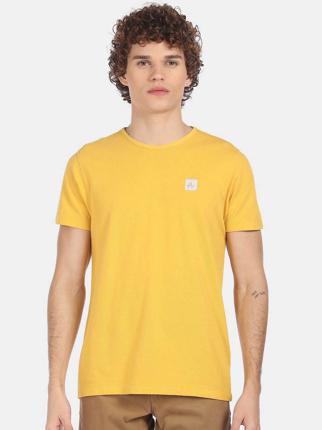 

Arrow Men Yellow Solid Pure Cotton Regular Fit T-shirt
