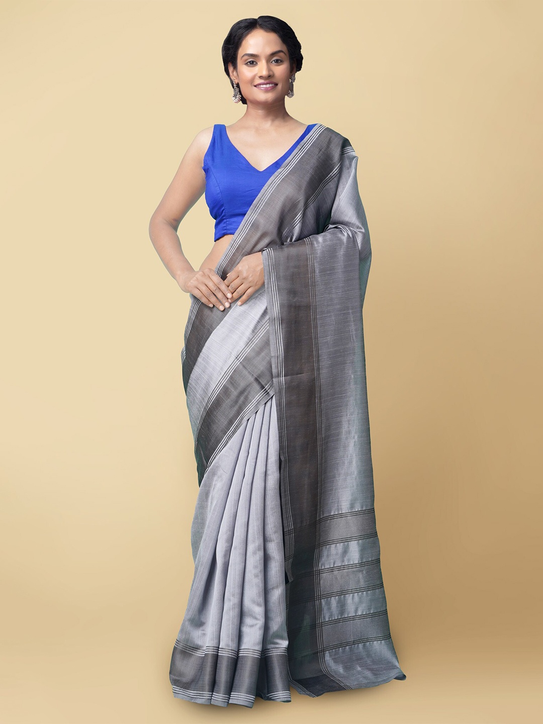 

Unnati Silks Grey Zari Art Silk Patola Saree