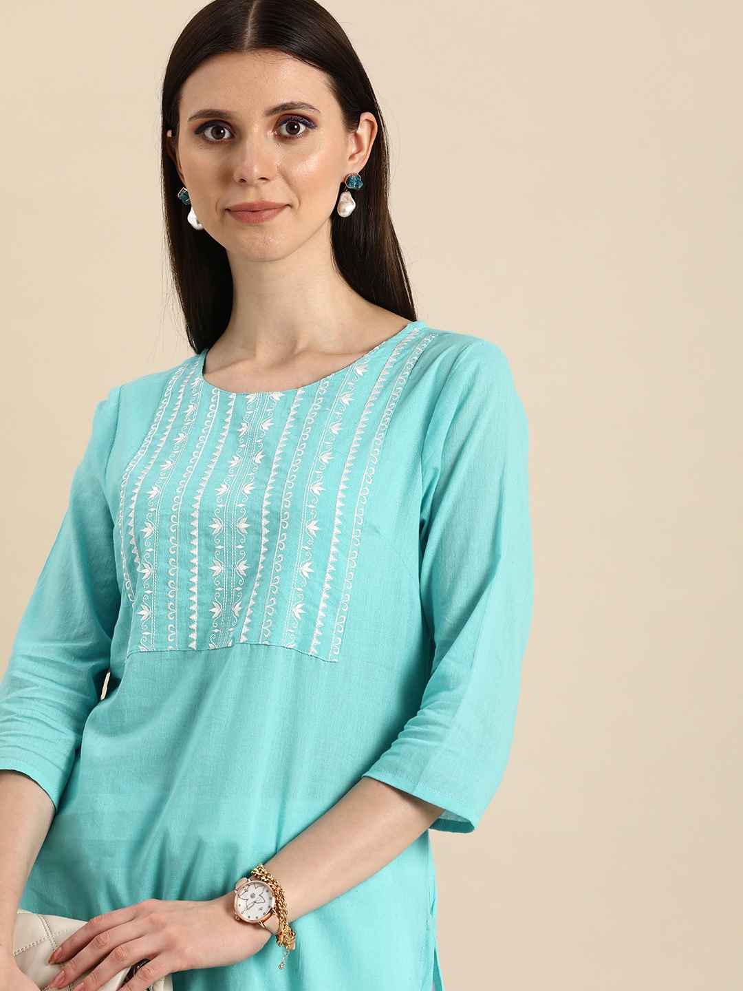 

Anouk Women Turquoise Blue Ethnic Motifs Yoke Design Thread Work Pure Cotton Kurta