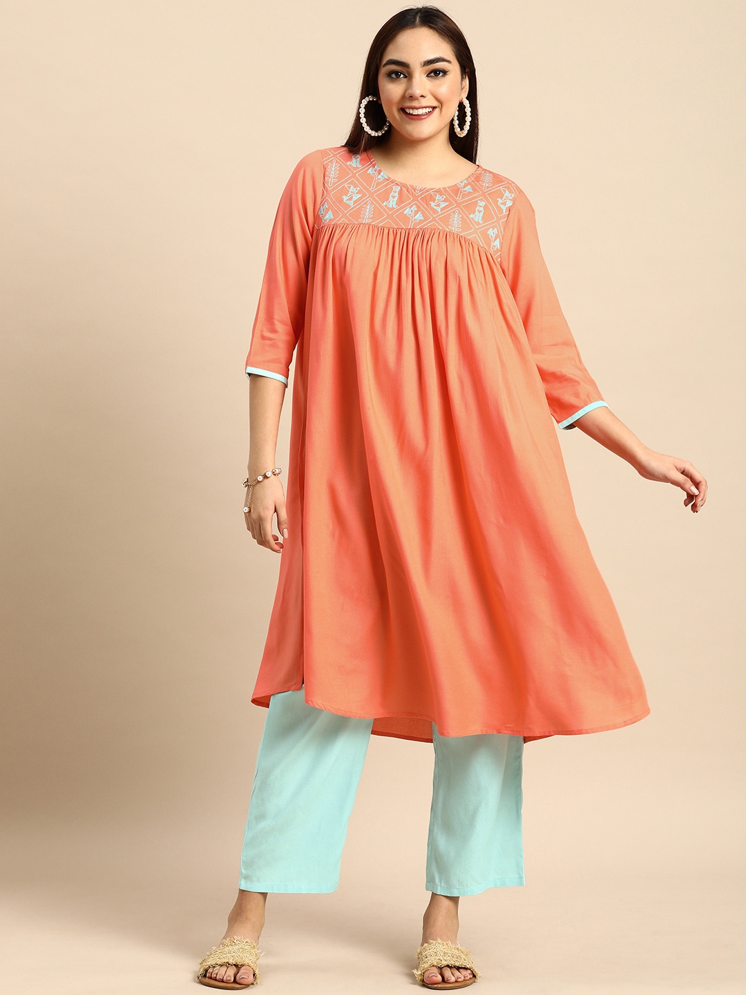 

Anouk Women Orange Ethnic Motifs Embroidered Empire Thread Work Kurta with Trousers