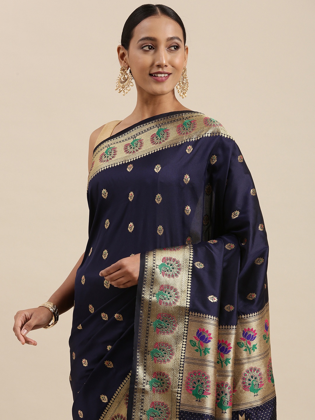 

Mitera Navy Blue & Golden Ethnic Motifs Woven Design Saree