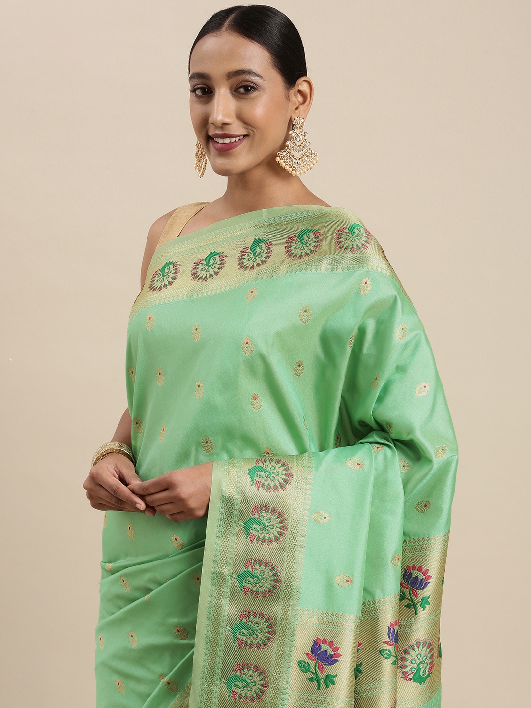 

Mitera Green & Golden Ethnic Motif Woven Design Saree
