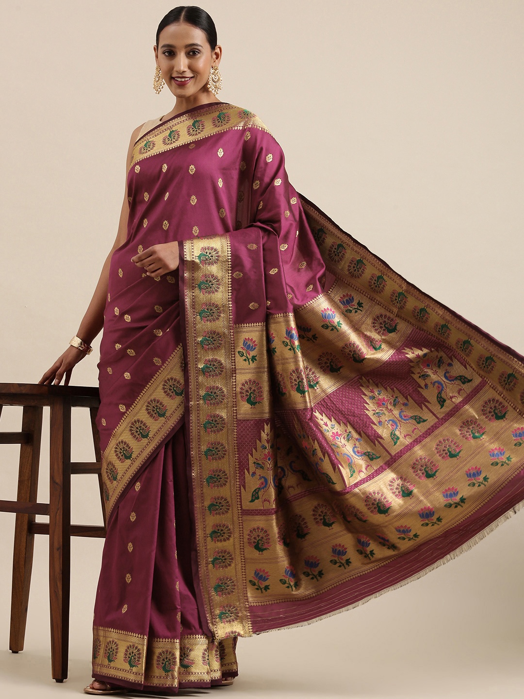 

Mitera Purple & Golden Ethnic Motifs Woven Design Saree