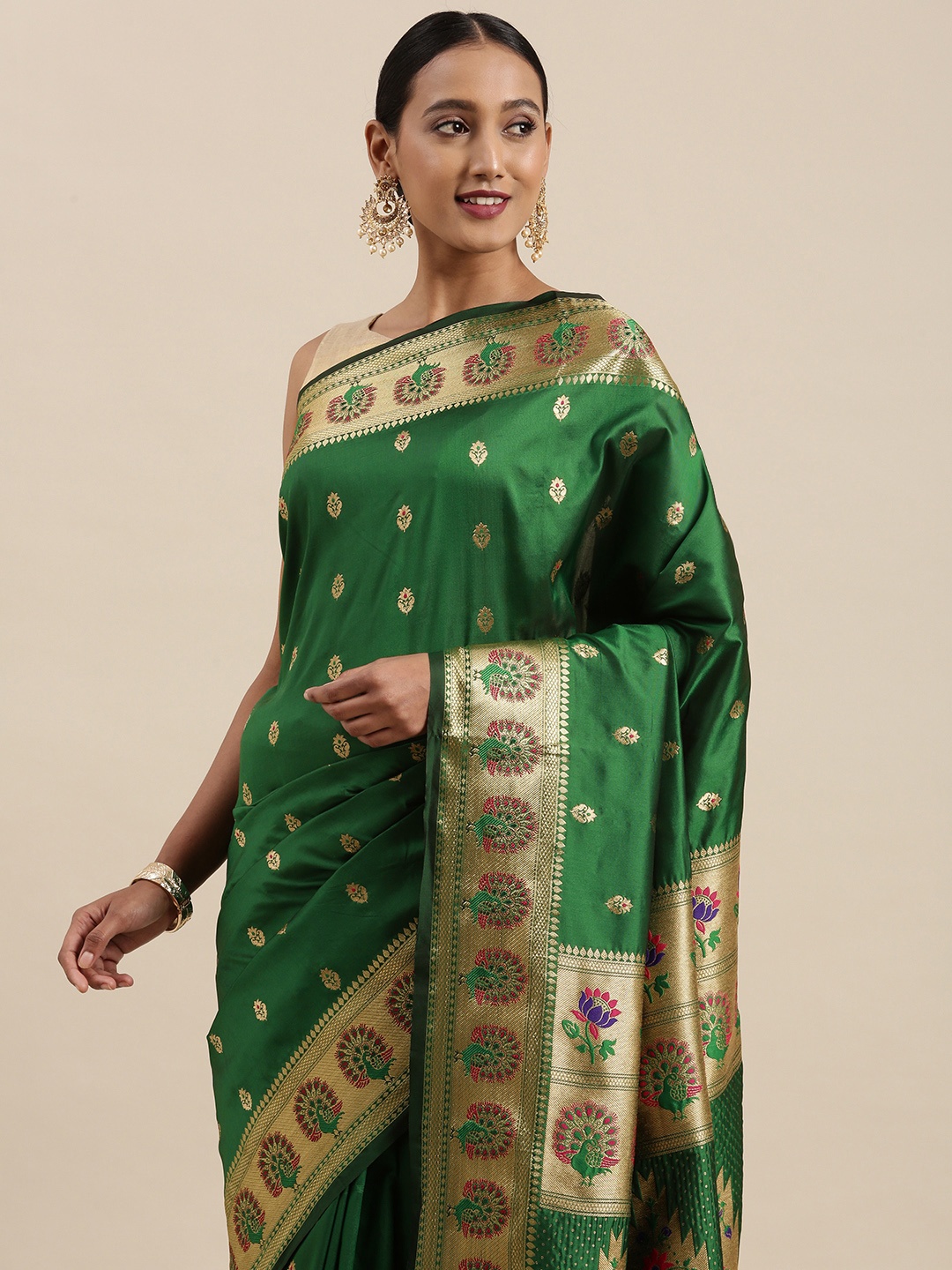 

Mitera Green & Golden Ethnic Motifs Woven Design Saree