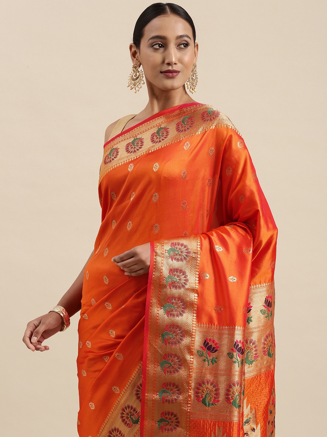 

Mitera Orange & Golden Ethnic Motifs Woven Design Saree