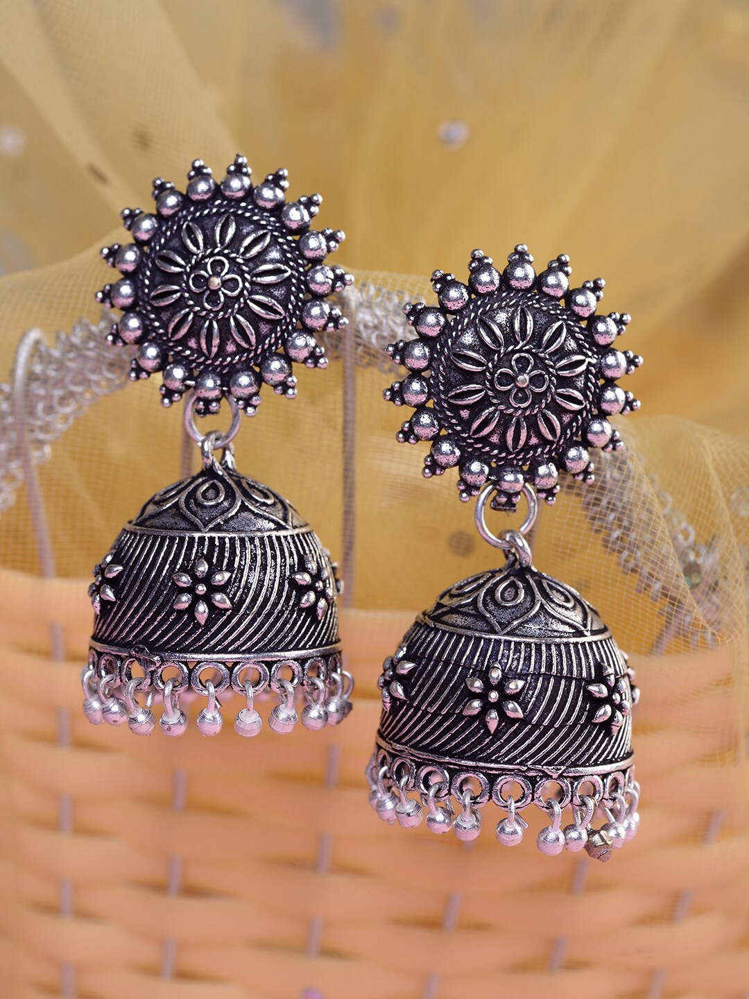 

Saraf RS Jewellery Silver-Toned Oxidised Dome Shaped Jhumkas Earrings