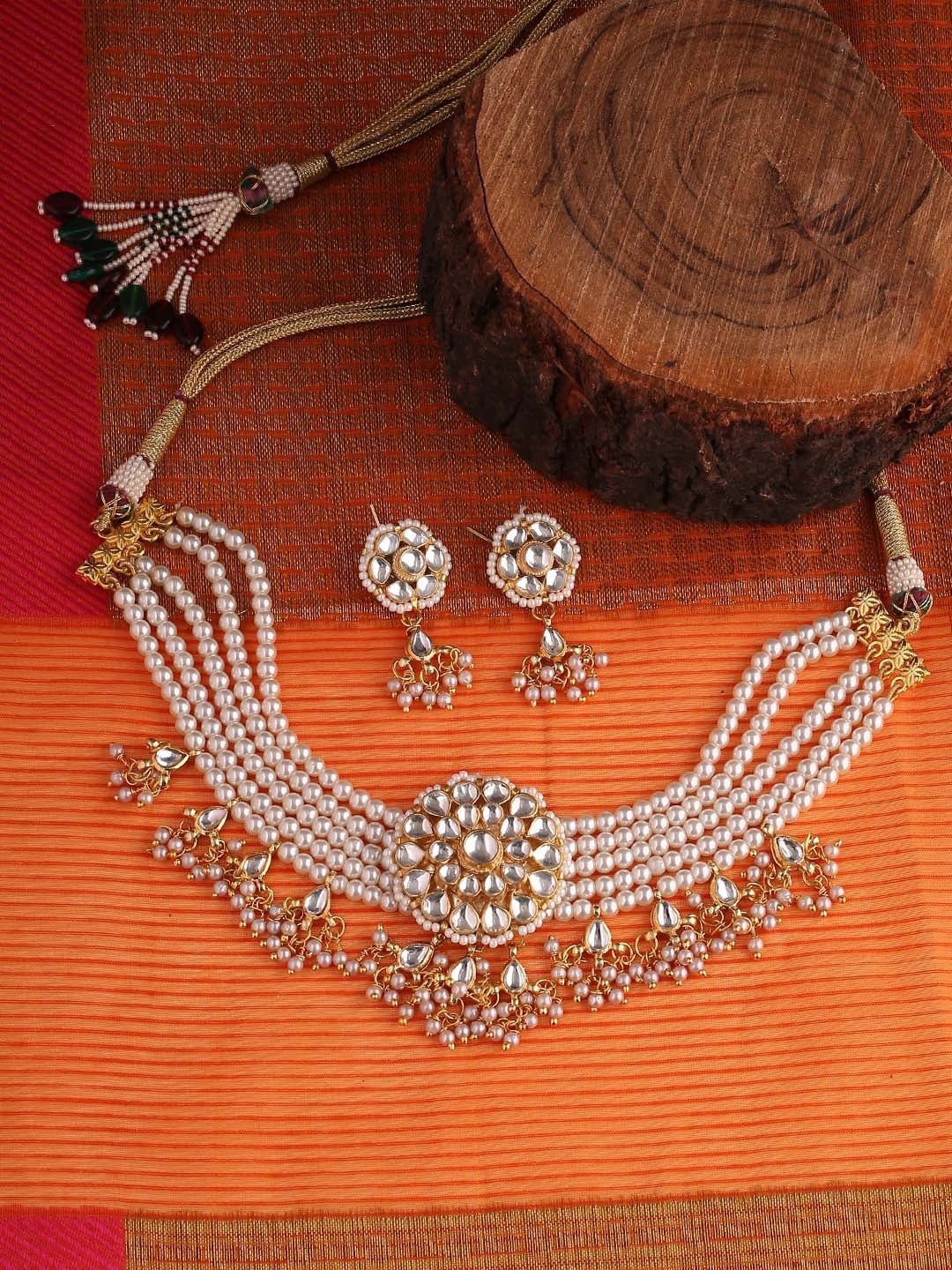 

Shoshaa Gold-Plated & Off-White Kundan Studded Choker Jewellery Set