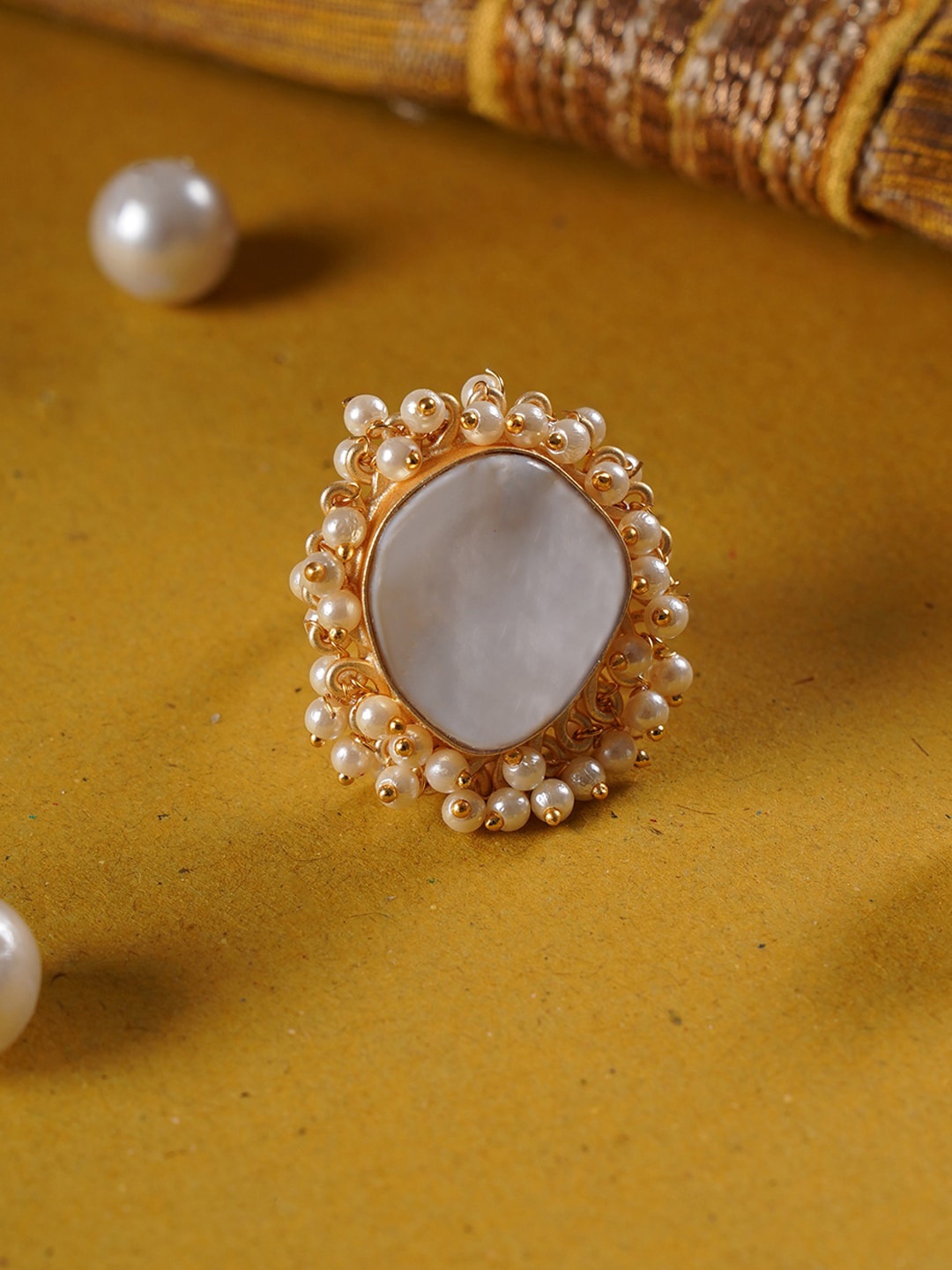 

Shoshaa Gold-Plated White Stone-Studded Beaded Finger Ring