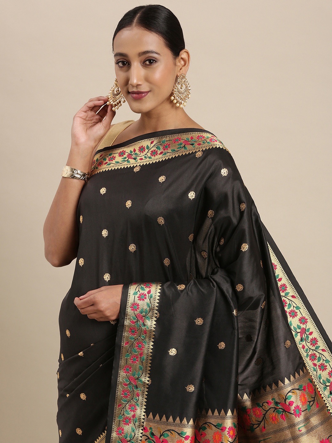 

Mitera Black & Golden Ethnic Motifs Woven Design Saree