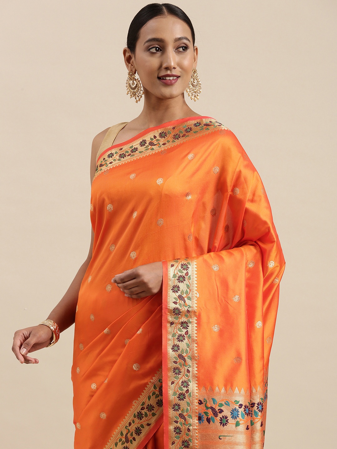 

Mitera Orange & Golden Ethnic Motifs Woven Design Saree