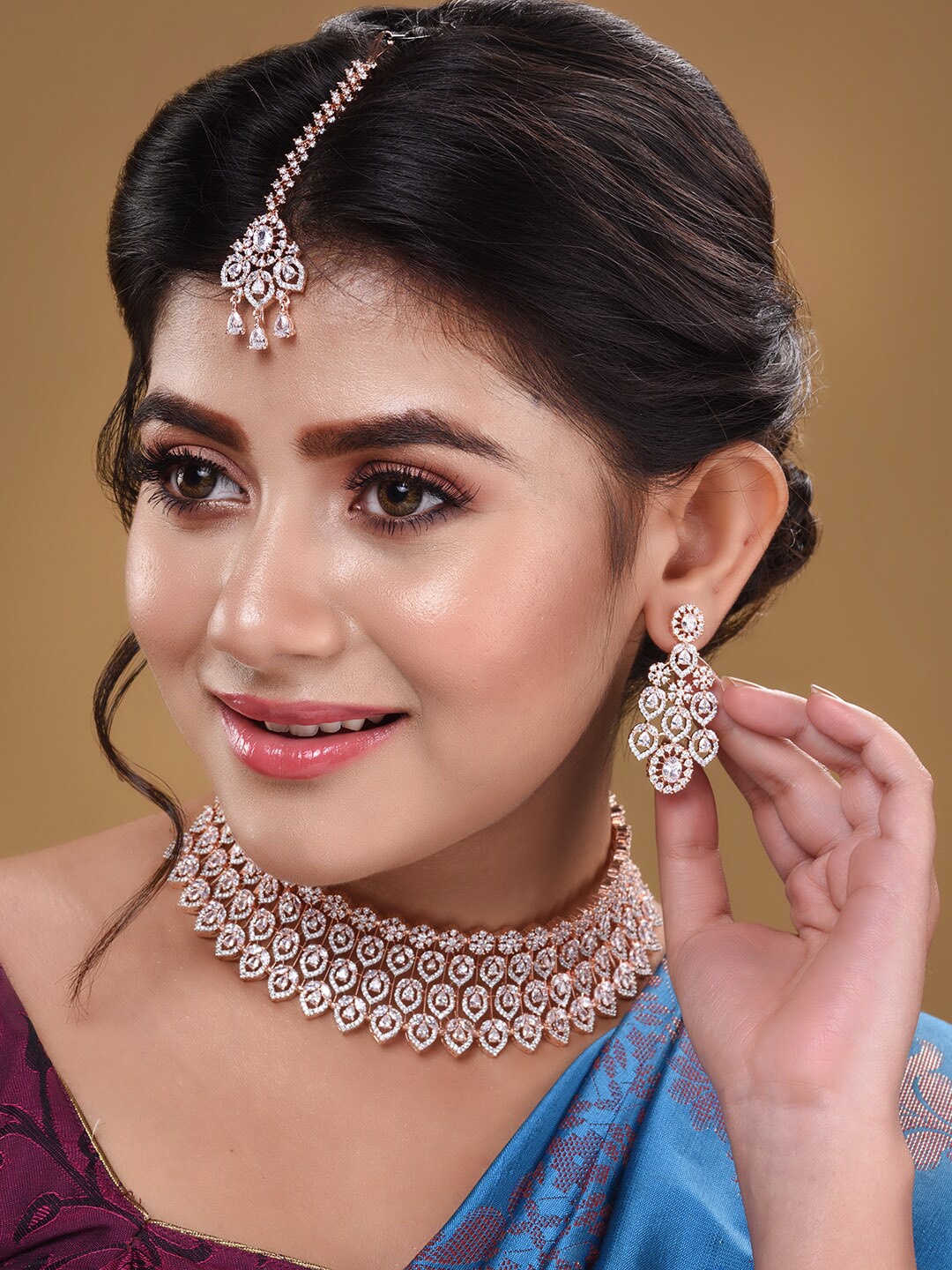 

Saraf RS Jewellery Rose Gold-Plated & White Studded Jewellery Set