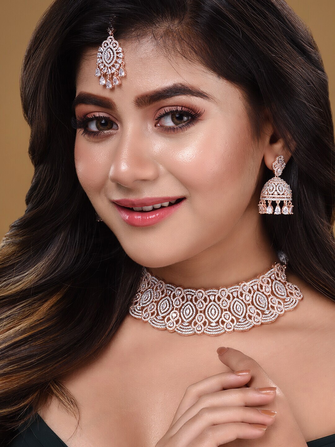 

Saraf RS Jewellery Women Rose Gold-Plated & White AD Stone Studded Jewellery Set