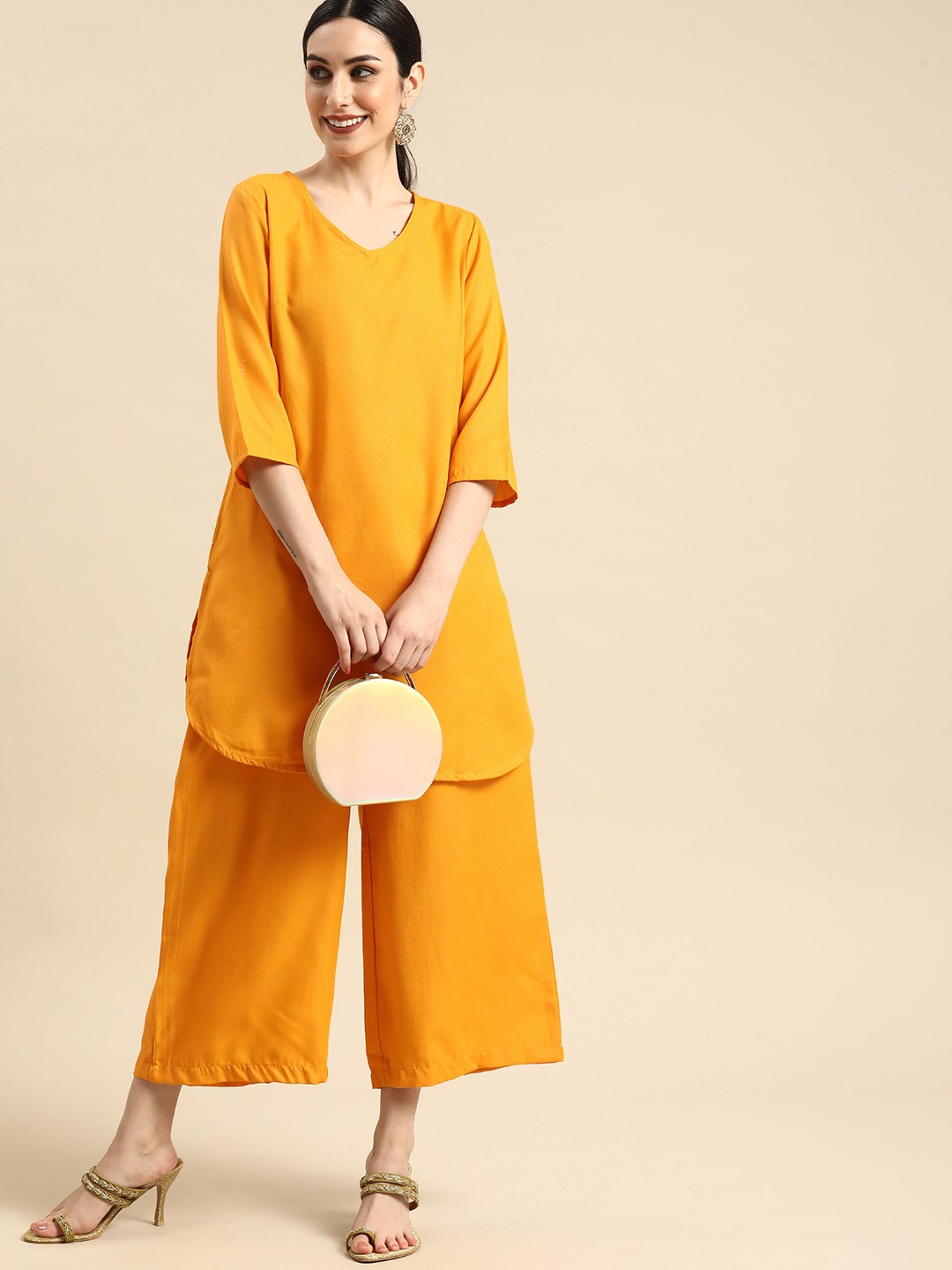 

Anouk Women Mustard Yellow Solid Kurta with Palazzos