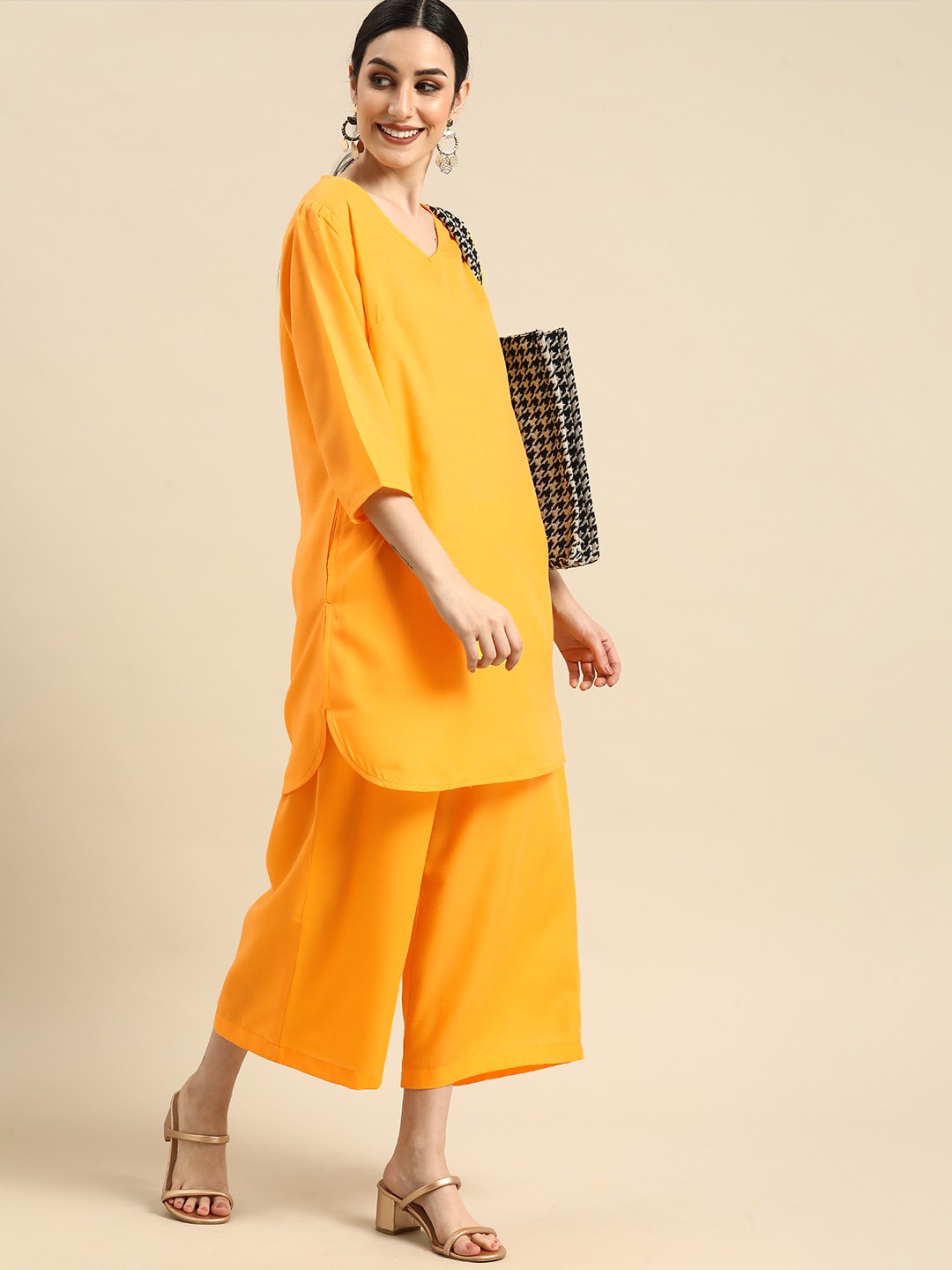 

Anouk Women Mustard Yellow Solid Kurta with Palazzos