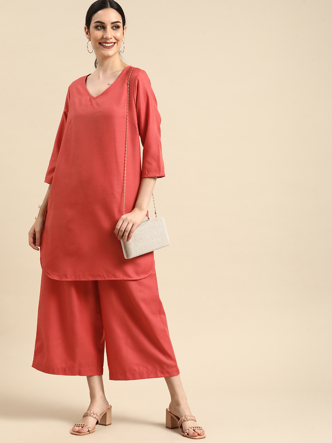 

Anouk Women Rust Orange Solid Kurta with Palazzos