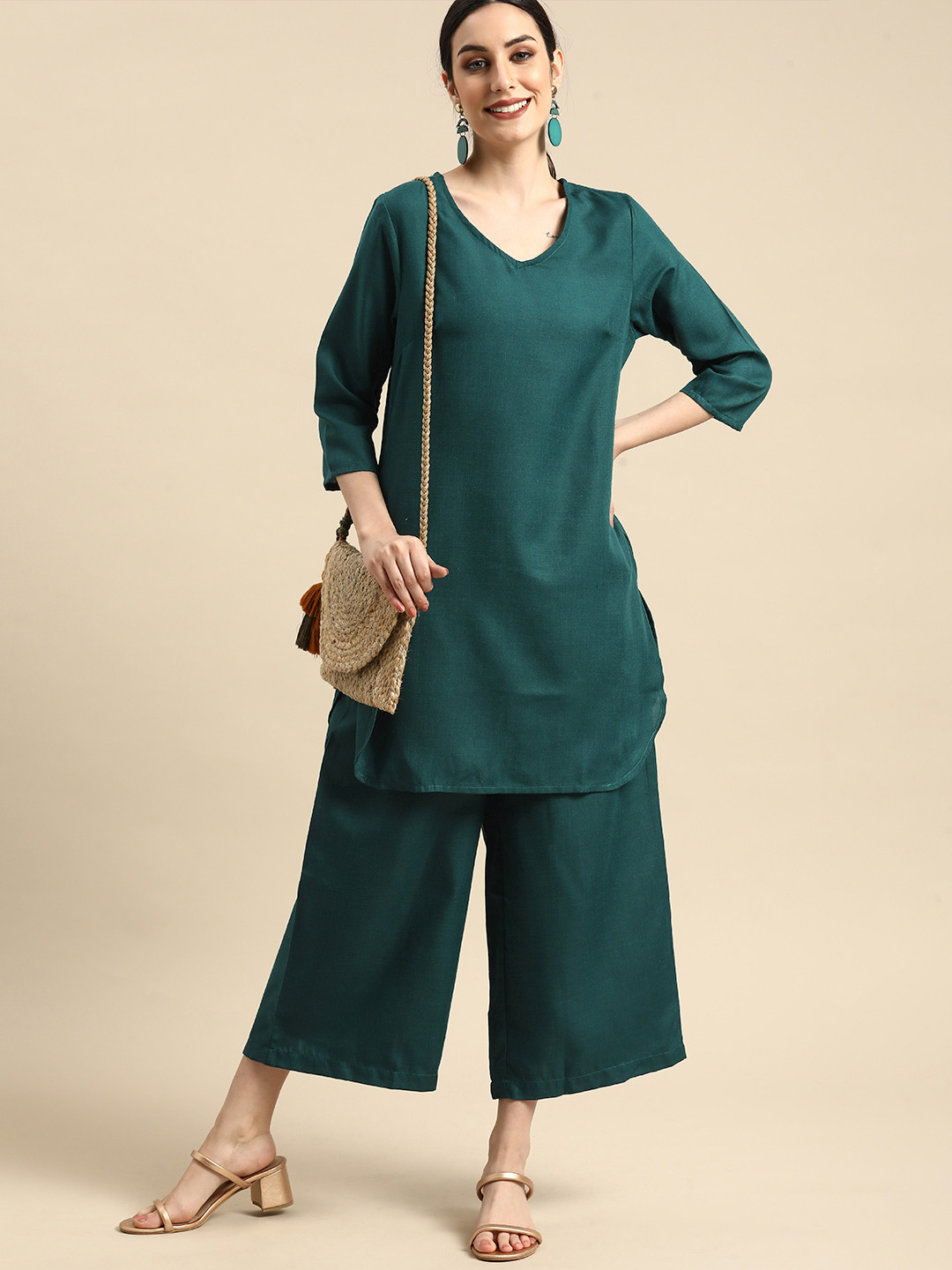 

Anouk Women Teal Green Solid Kurta with Palazzos