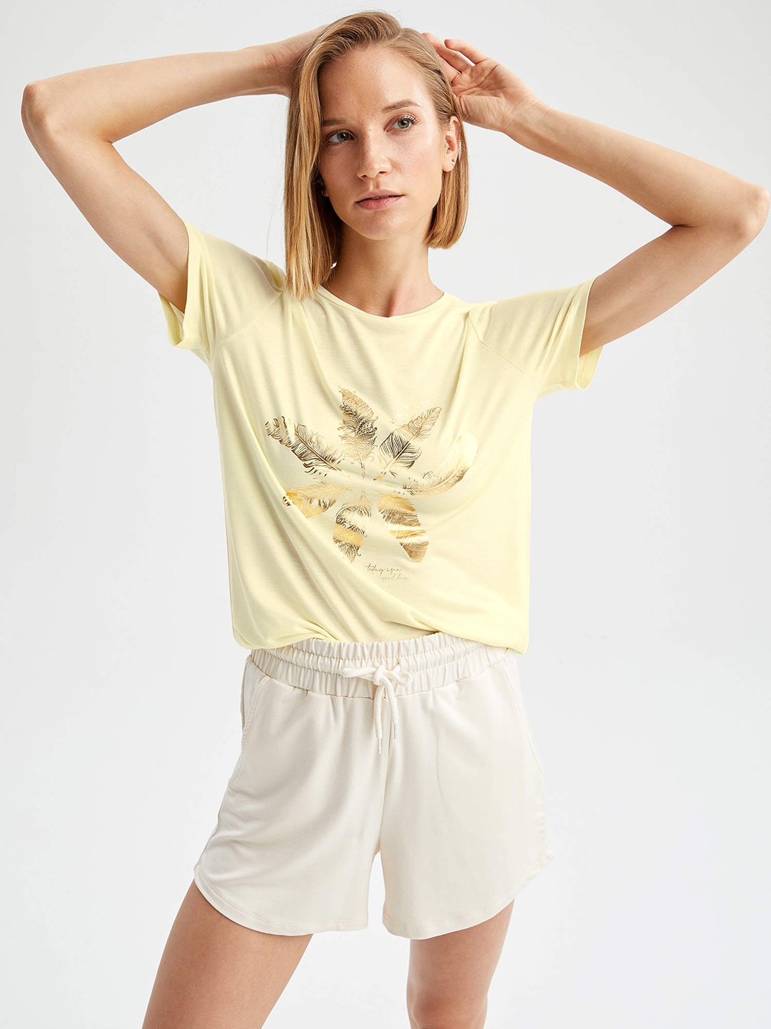

DeFacto Women Yellow & Golden Typography Printed T-shirt