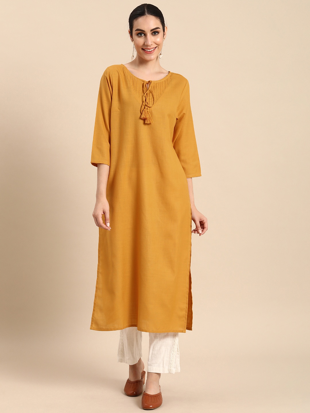 

Anouk Women Mustard Yellow Solid Tie-Up Neck Straight Kurta