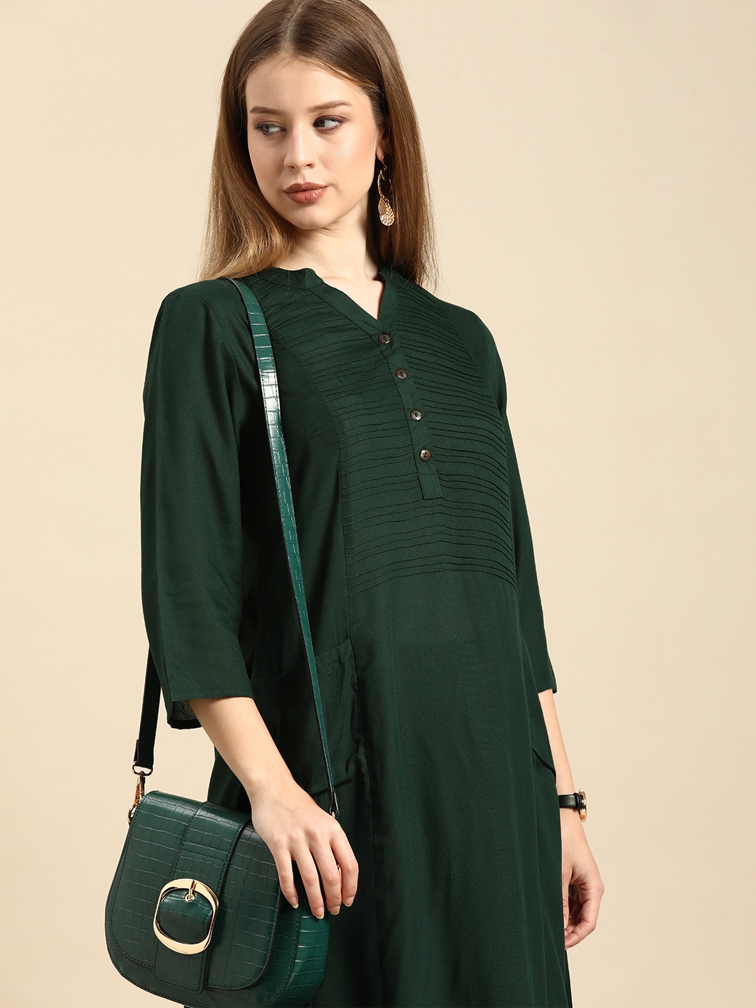 

Anouk Women Green Solid Kurta