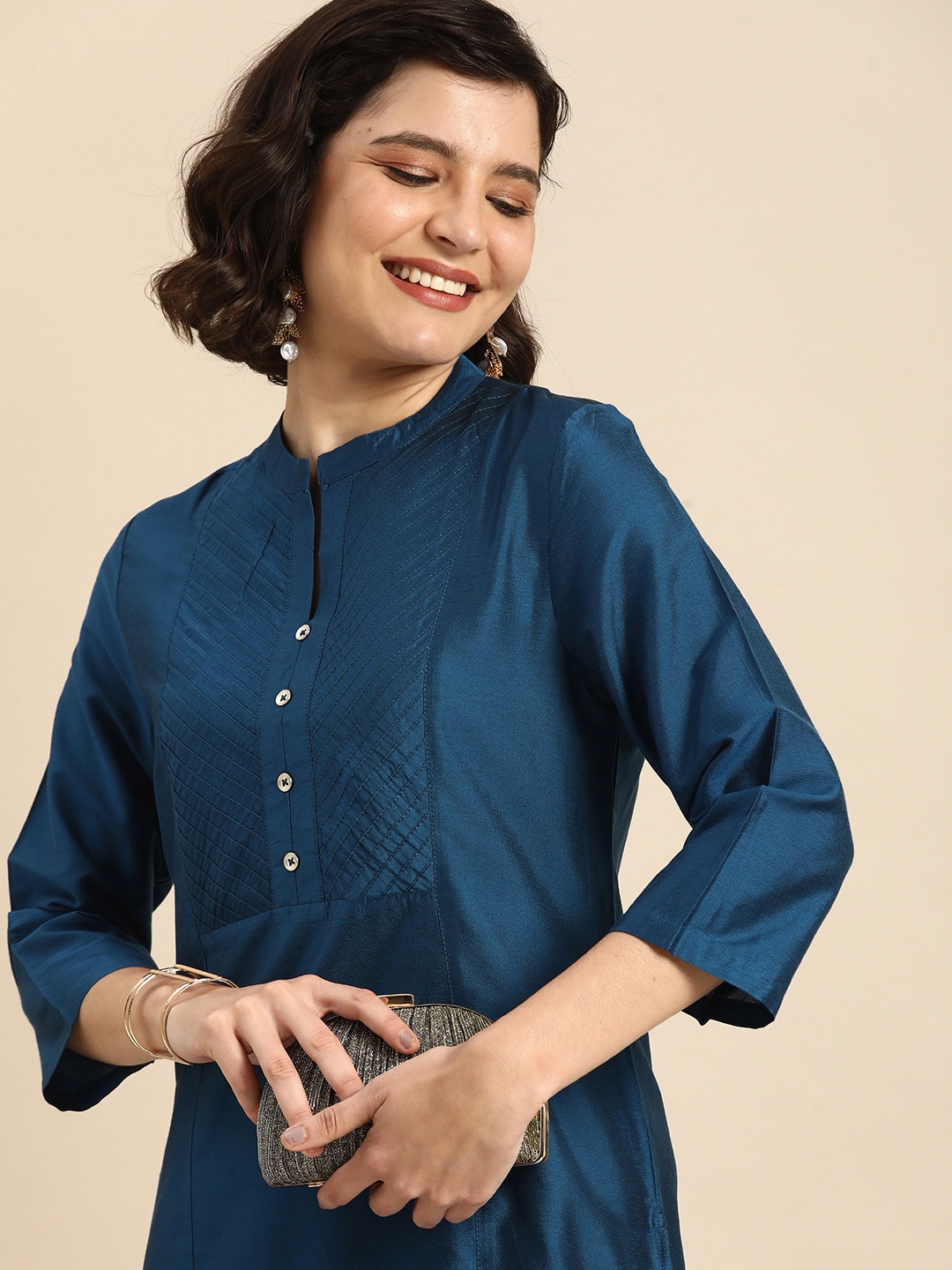 

Anouk Women Blue Striped V-Neck Regular Kurta With Pin Tuck Detail