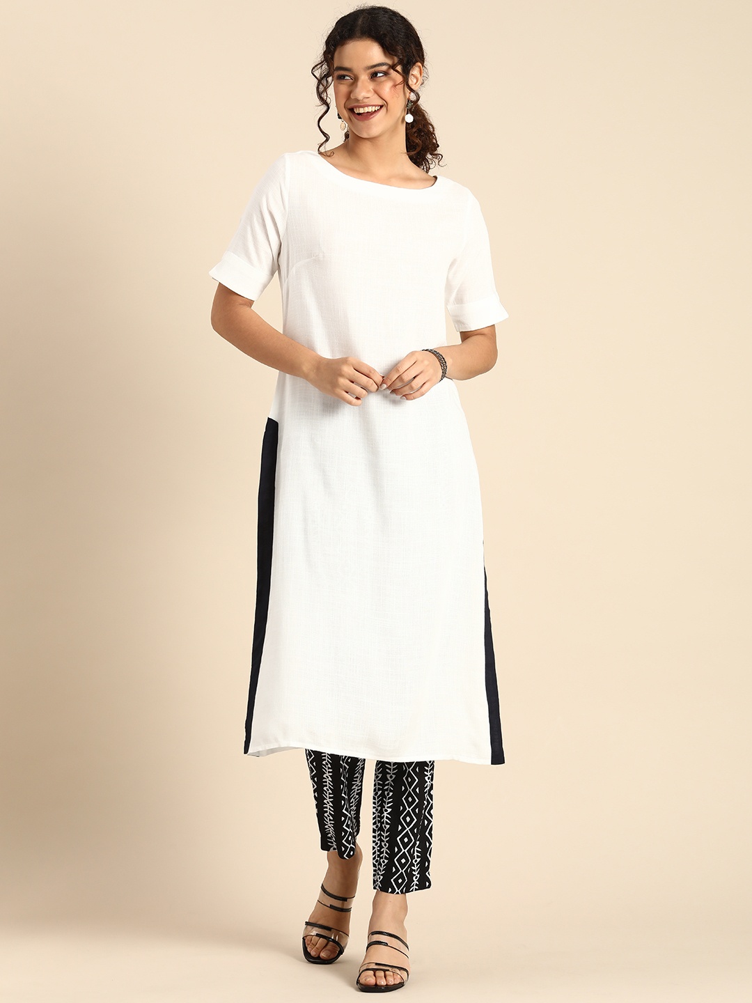 

Anouk Women White Solid Kurta