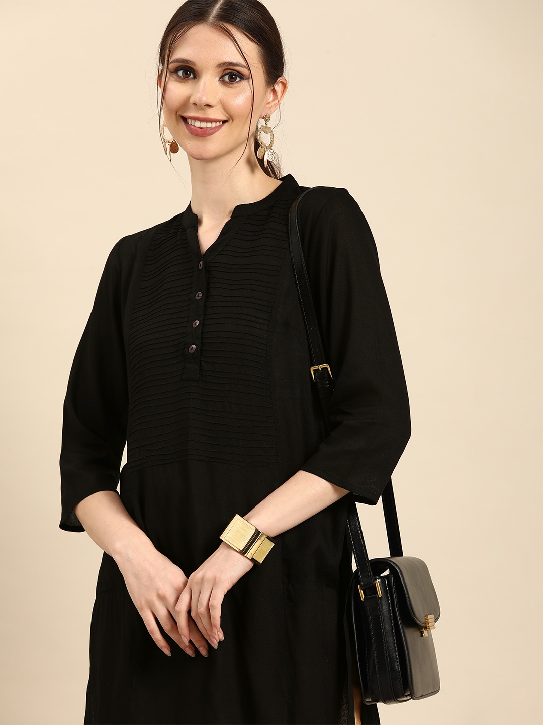 

Anouk Women Black Solid Kurta