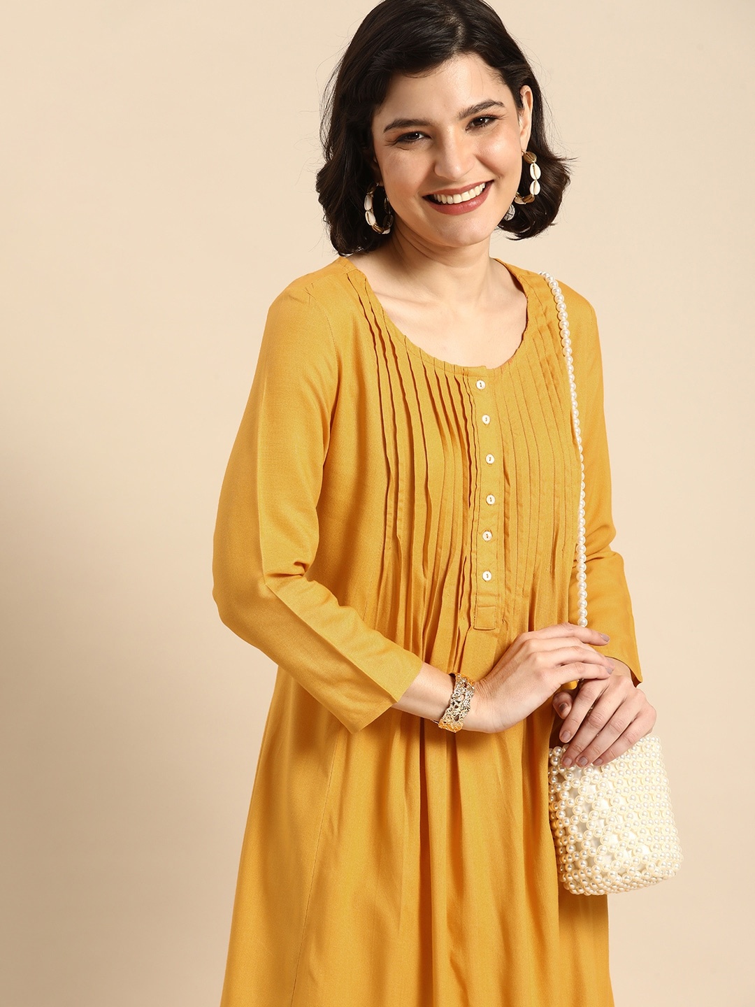 

Anouk Women Mustard Yellow Striped Round Neck A-Line Kurta With Pin Tuck Detail