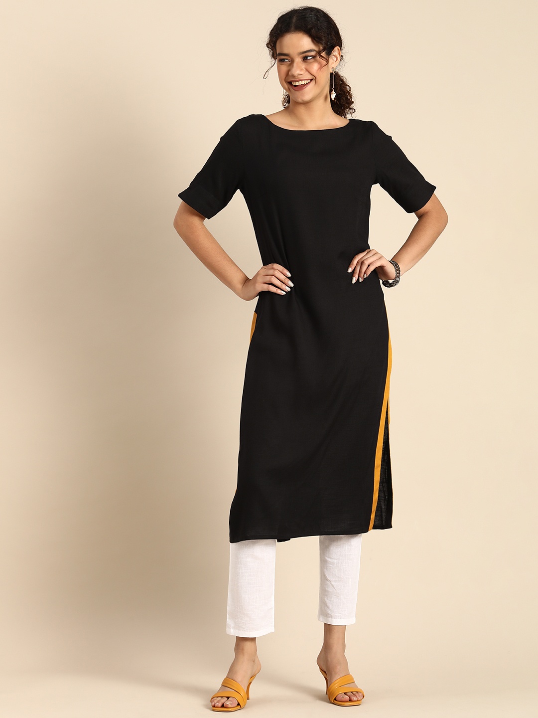 

Anouk Women Black Solid Kurta
