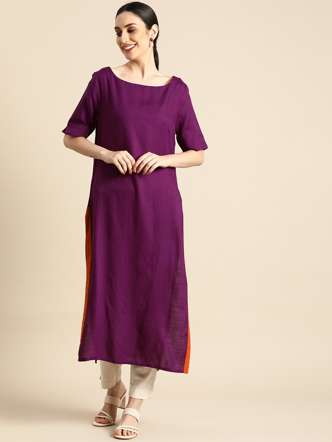 

Anouk Women Purple Solid Round Neck Kurta