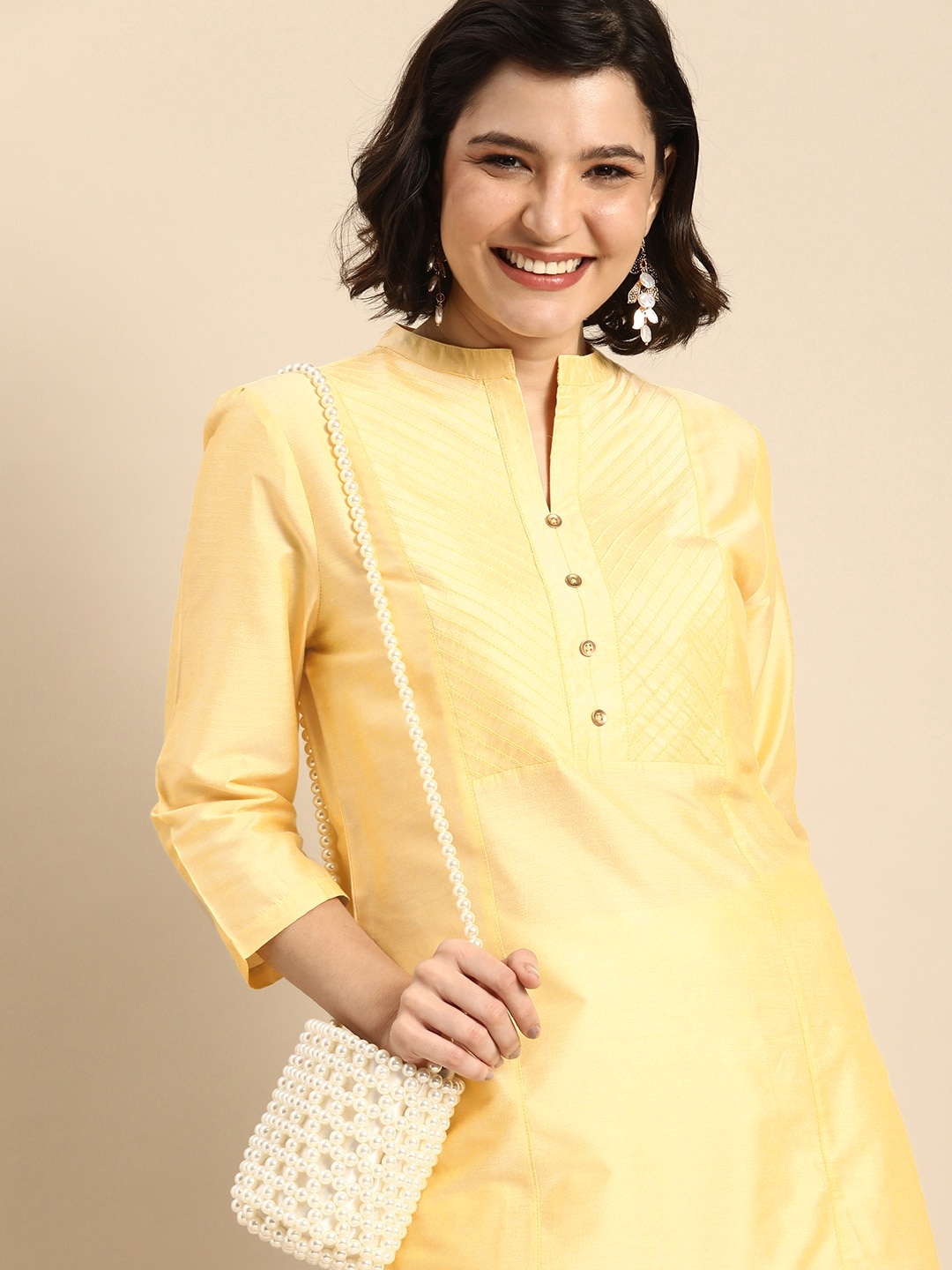 

Anouk Women Yellow Striped V-Neck Regular Kurta With Pin Tuck Detail