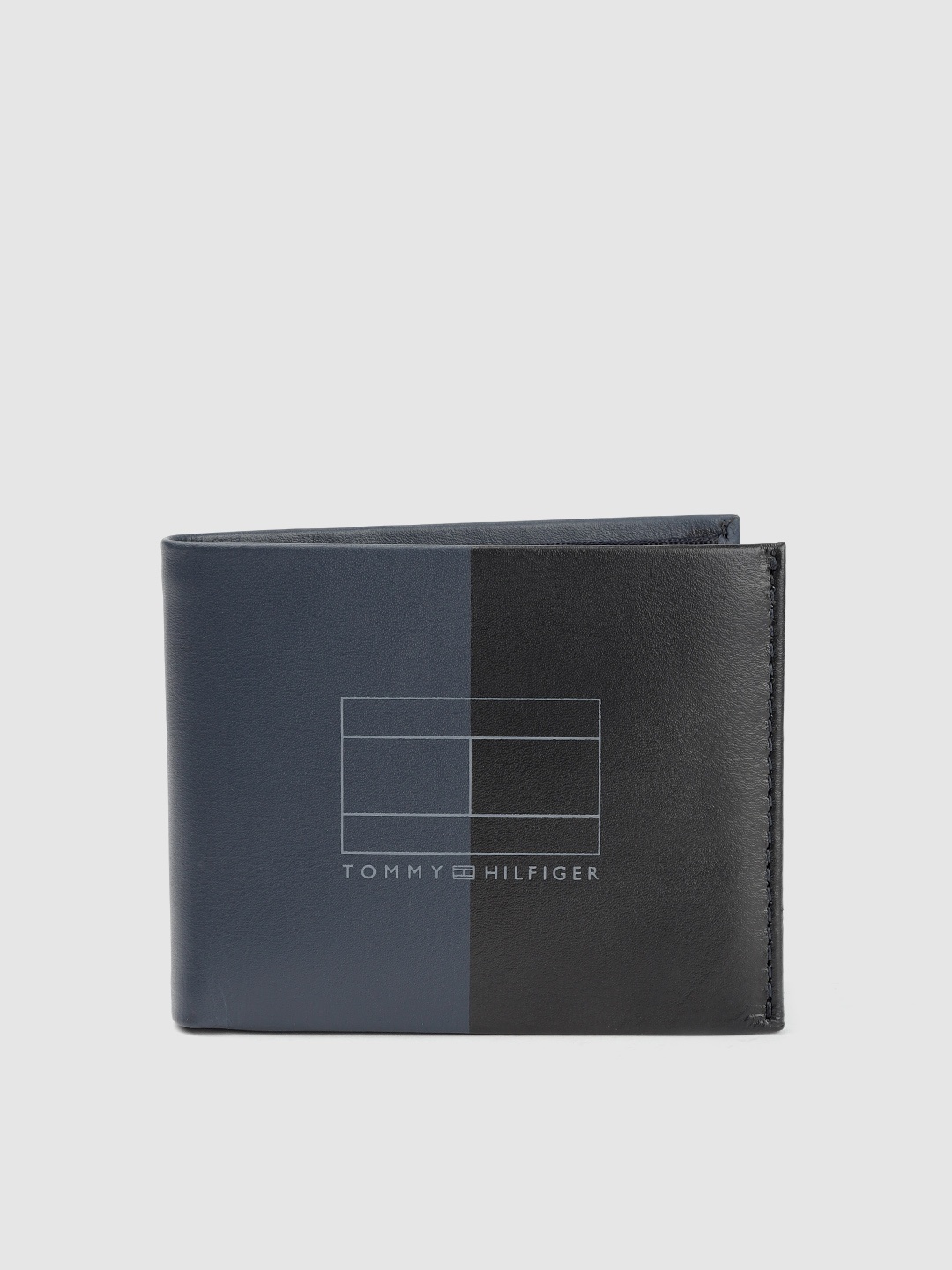 

Tommy Hilfiger Men Blue & Black Colourblocked Leather Two Fold Wallet
