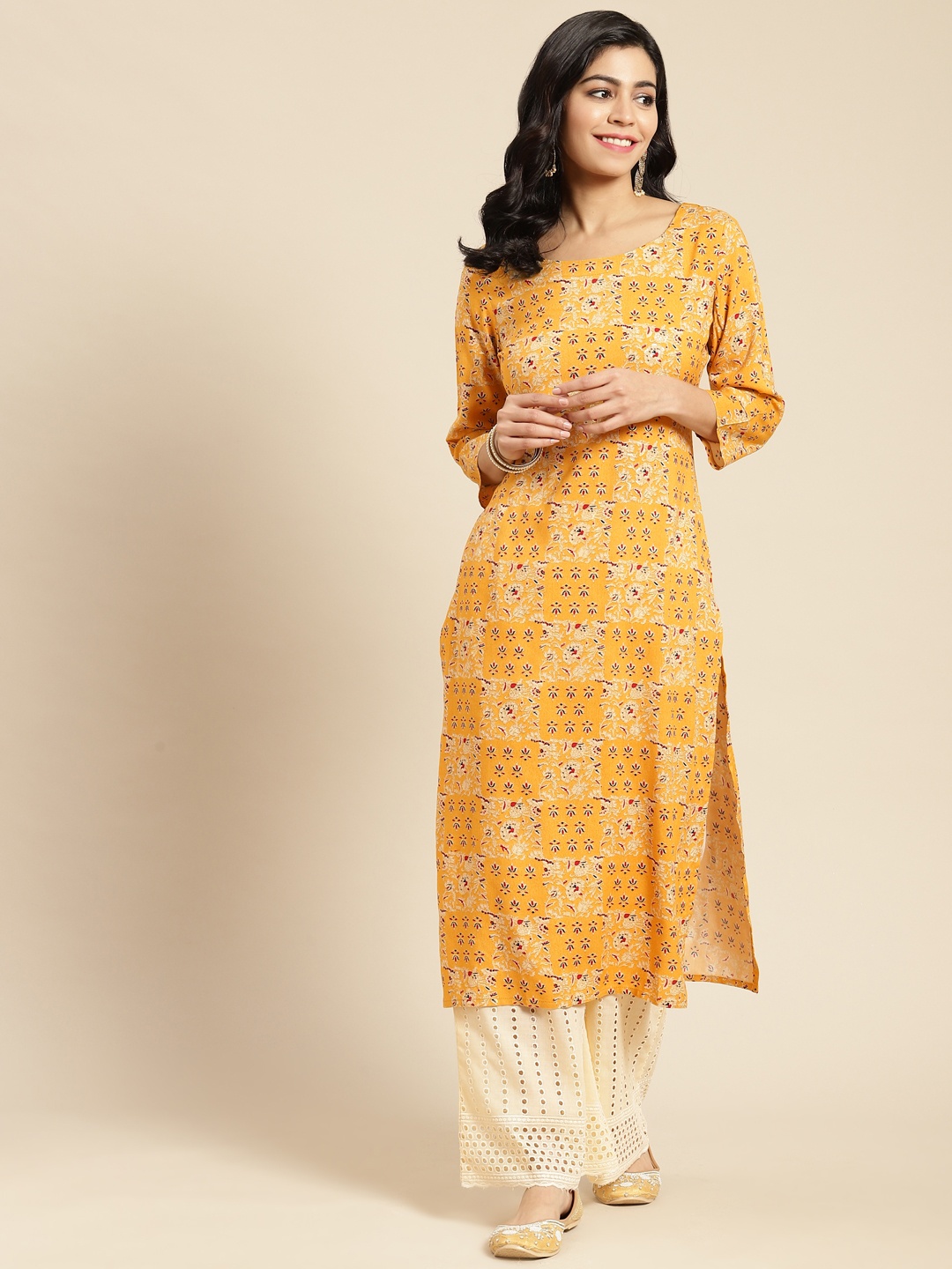 

Prakhya Women Yellow Ethnic Motifs Printed Kurta with Palazzos