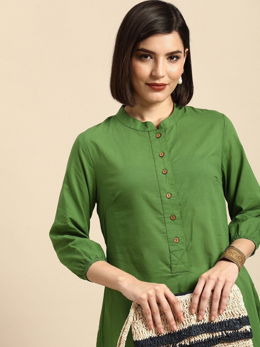 

Anouk Women Green Solid Pure Cotton Kurta