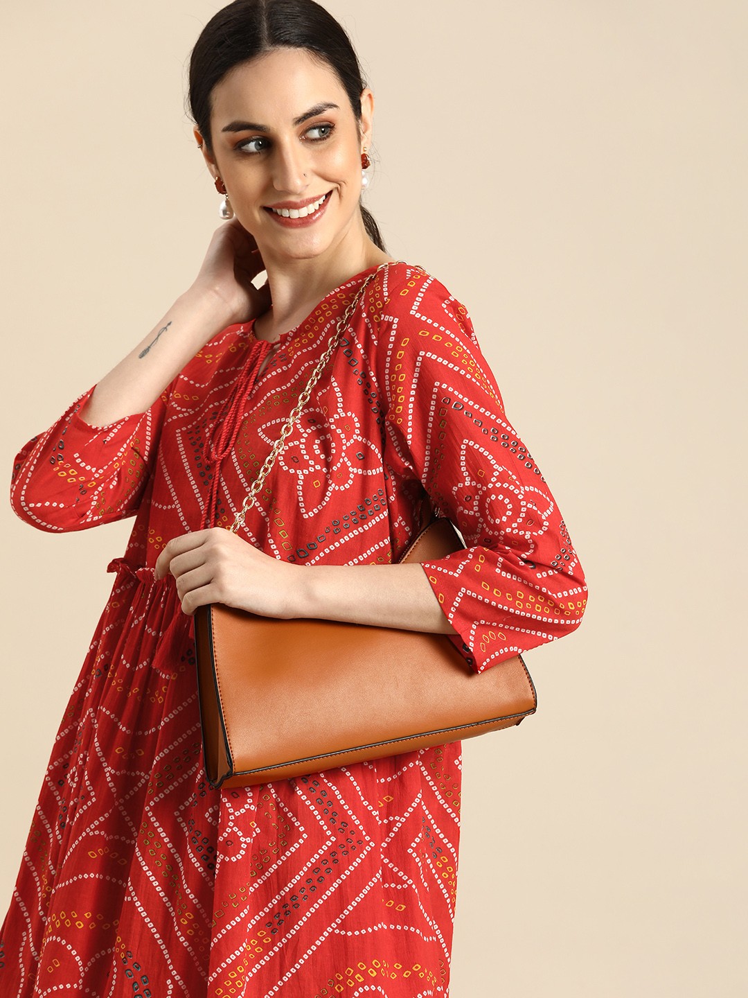 

Anouk Red & White Bandhani Printed Tie-Up Neck Fit And Flare Ethnic Dress