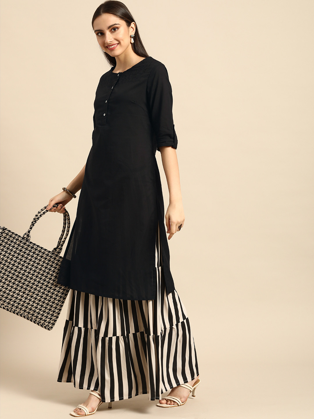

Anouk Women Black Solid Pure Cotton Kurta